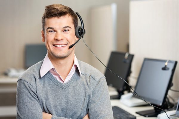 Portrait of confident male customer service representative with