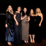 Principality Building Society collect the Customer Engagement award from comedian Katherine Ryan (left) and sponsor Ring Central (right)