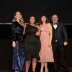 Legal & General Insurance win the small contact centre of the year inhouse award from Katherine Ryan (left) and sponsor V12 Retail Finance
